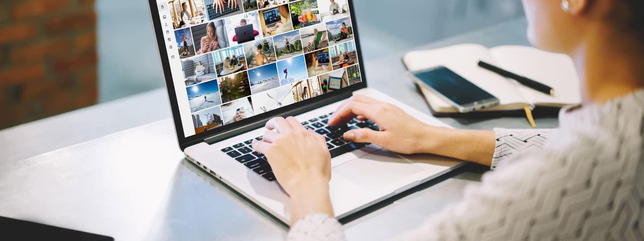 Lady sitting at laptop using NTB Lens